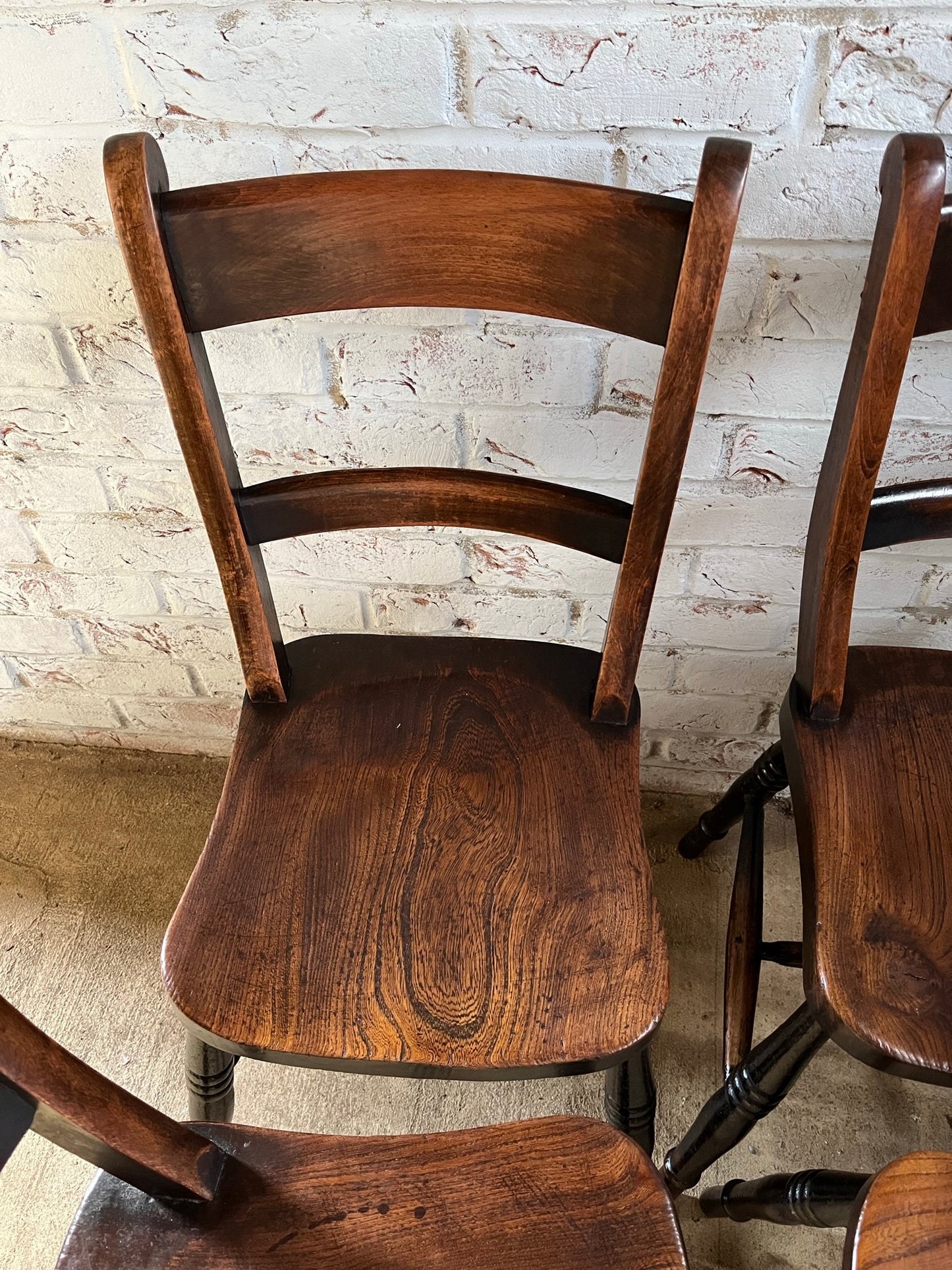 Good set of four C19th stamped kitchen chairs.