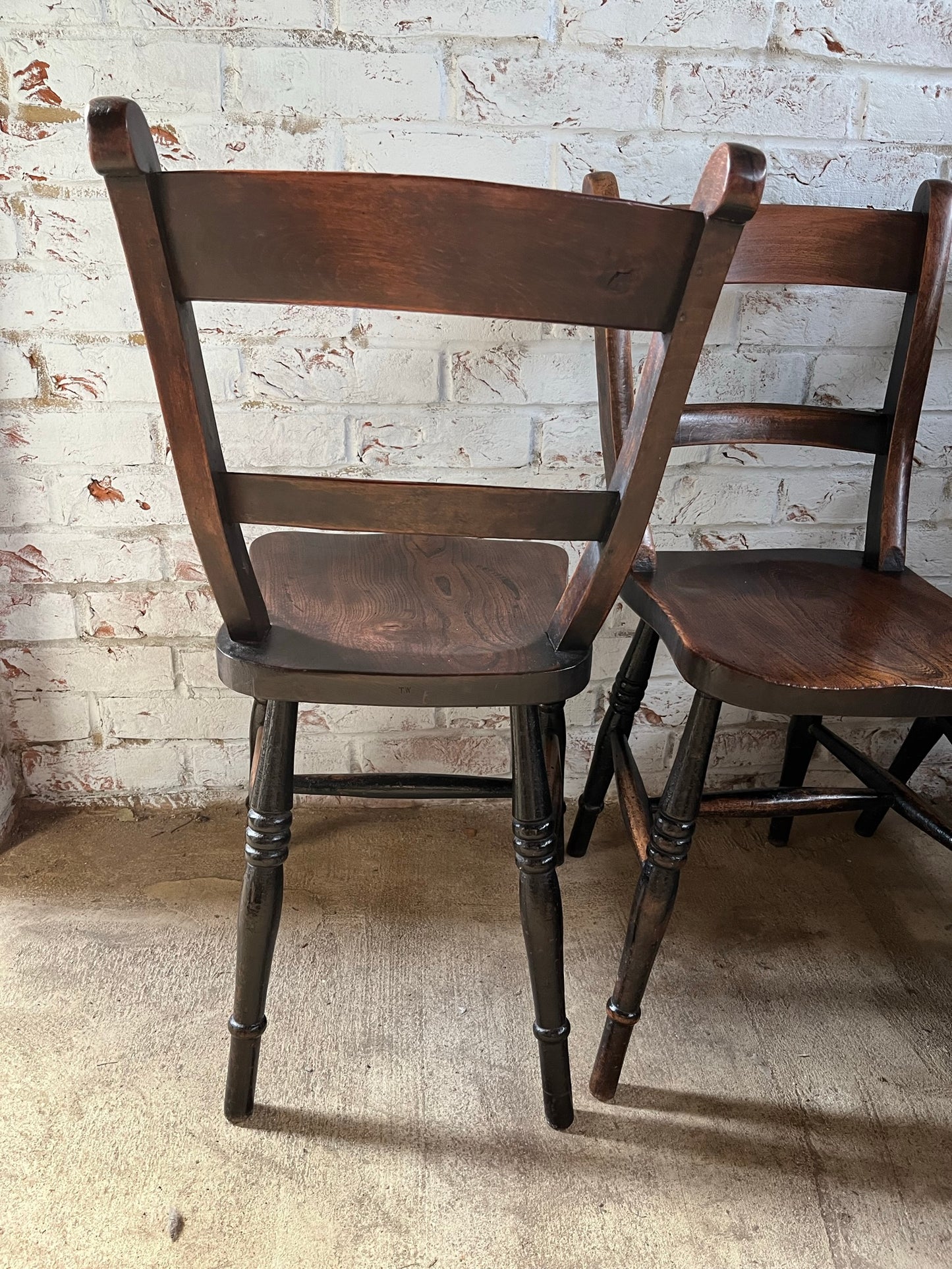 Good set of four C19th stamped kitchen chairs.