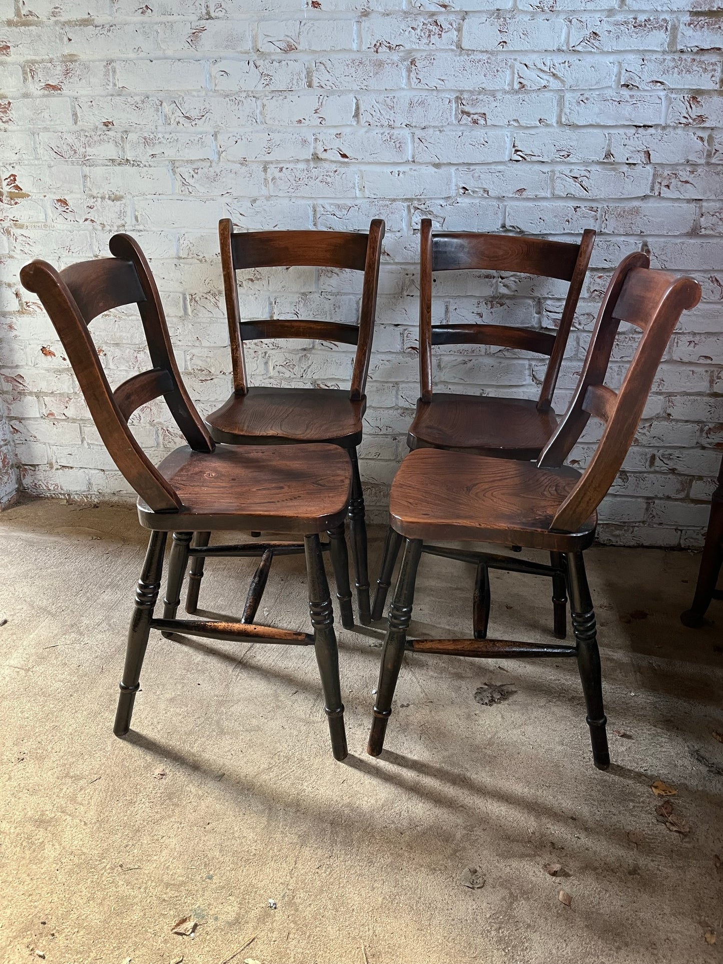 Good set of four C19th stamped kitchen chairs.