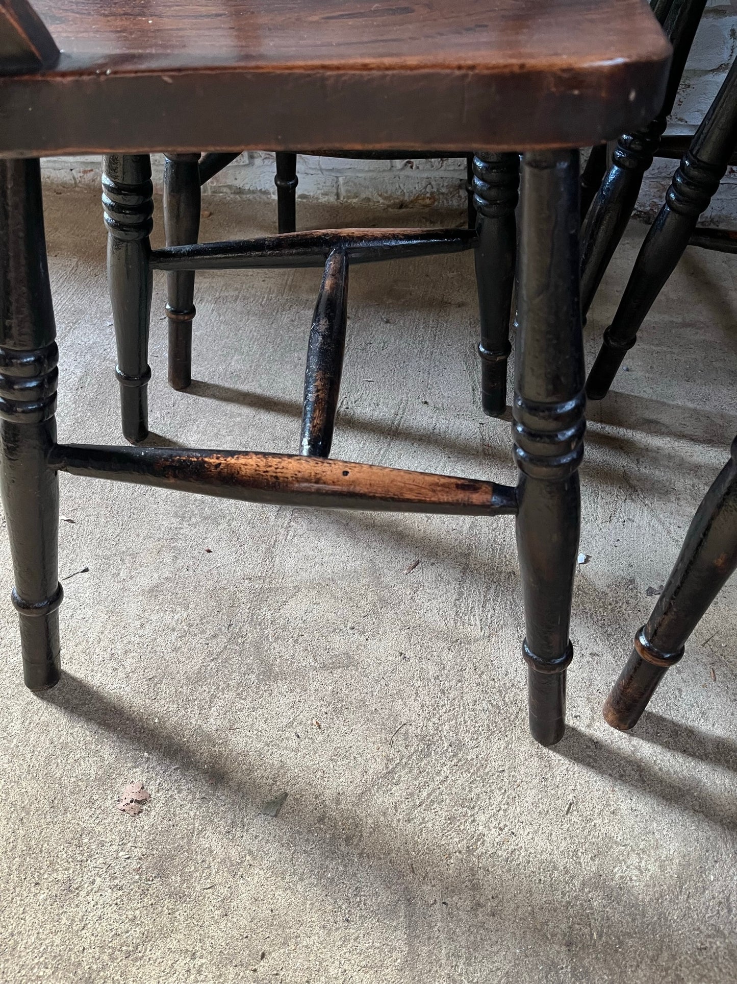 Good set of four C19th stamped kitchen chairs.