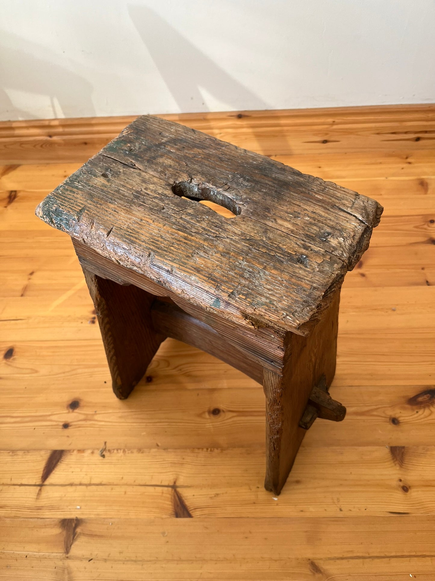 Estate made rustic wooden stool.