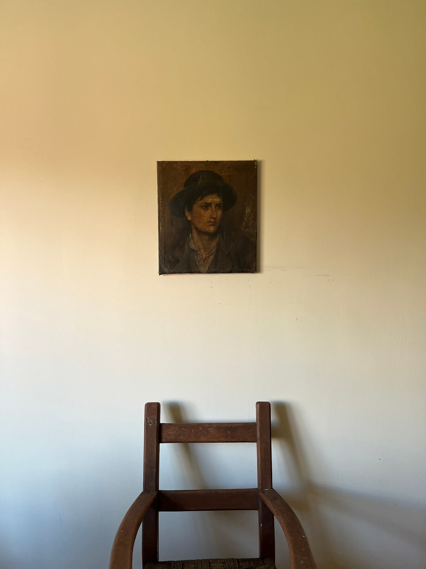 19th century oil painting of a young man.