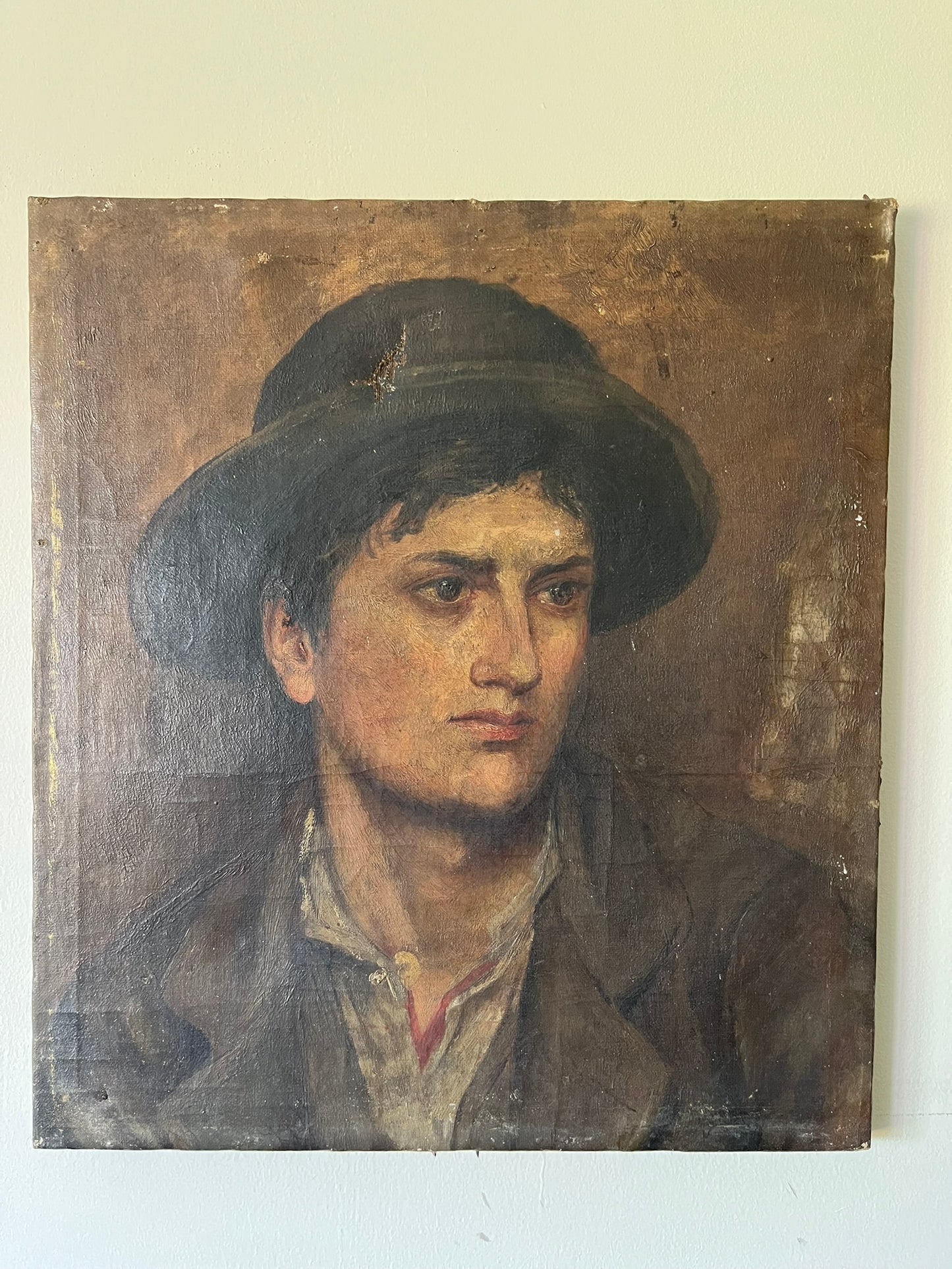 19th century oil painting of a young man.