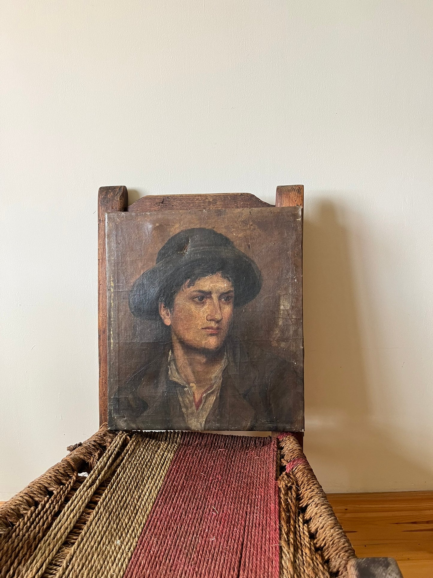 19th century oil painting of a young man.