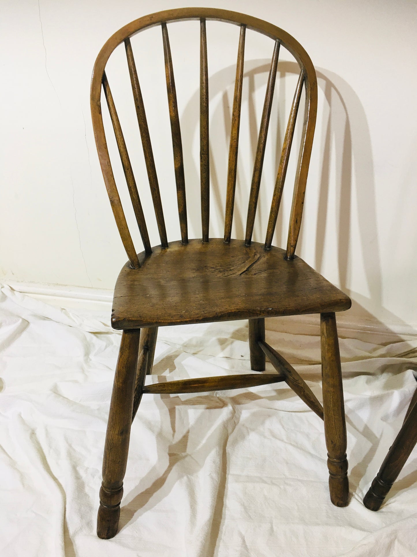 Pair of 18th or early 19th century spindle back west country chairs,