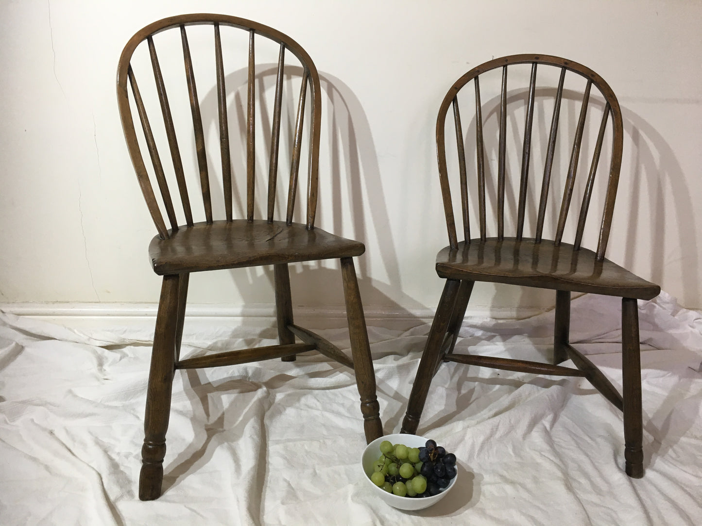 Pair of 18th or early 19th century spindle back west country chairs,