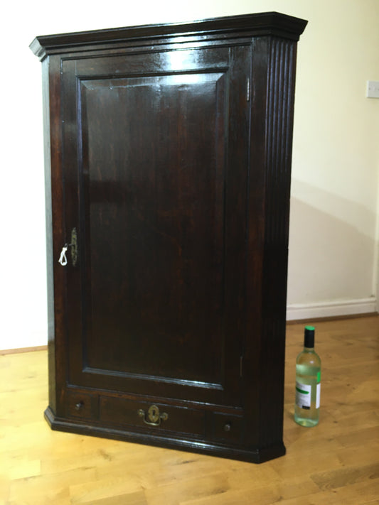 Early 18th century Georgian oak corner cupboard (with spooky writing)