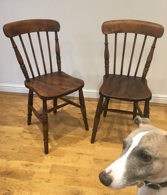 A pair of Victorian spindle-back kitchen chairs.