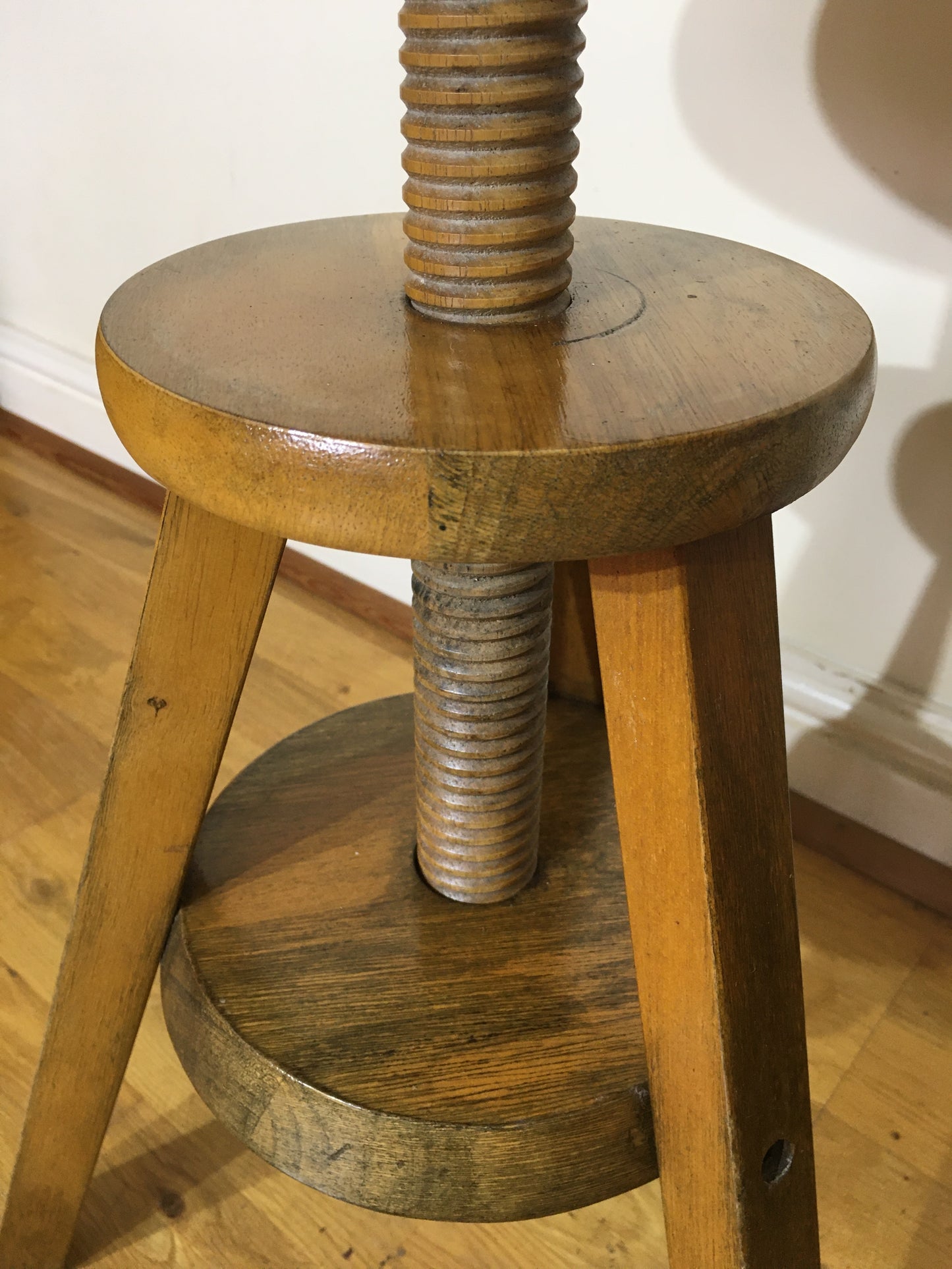 Vintage adjustable wooden artist's or potter's stool.