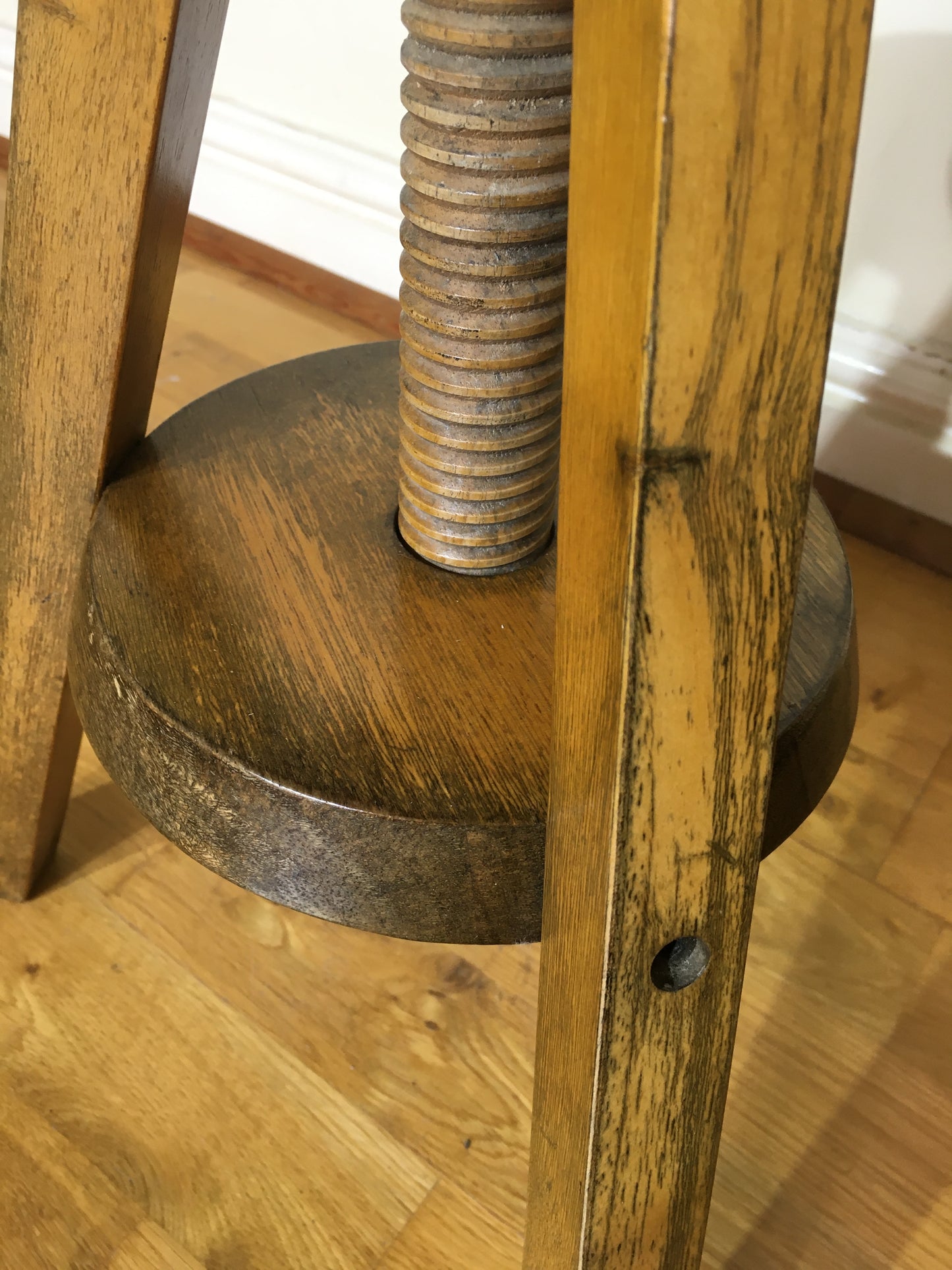 Vintage adjustable wooden artist's or potter's stool.