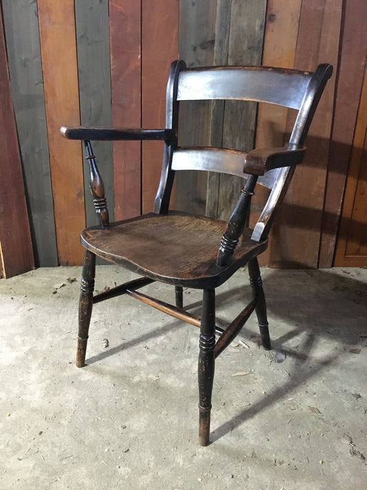 Late 19th century black-painted antique farmhouse kitchen chair.