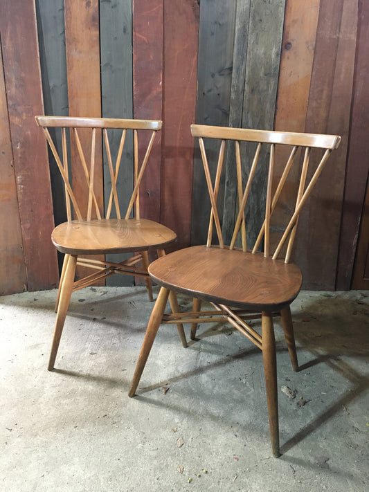 Pair of Ercol latticed 'candlestick' Windsor chairs, model 376, 1960.