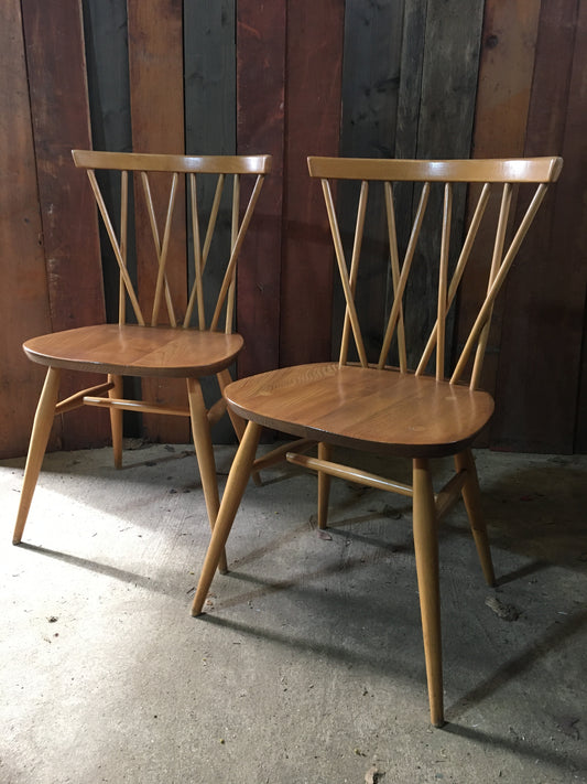 Pair of Ercol latticed 'candlestick' Windsor chairs, model 376, 1978.