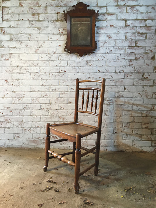 Early 19th century (or earlier) spindle-back side chair.