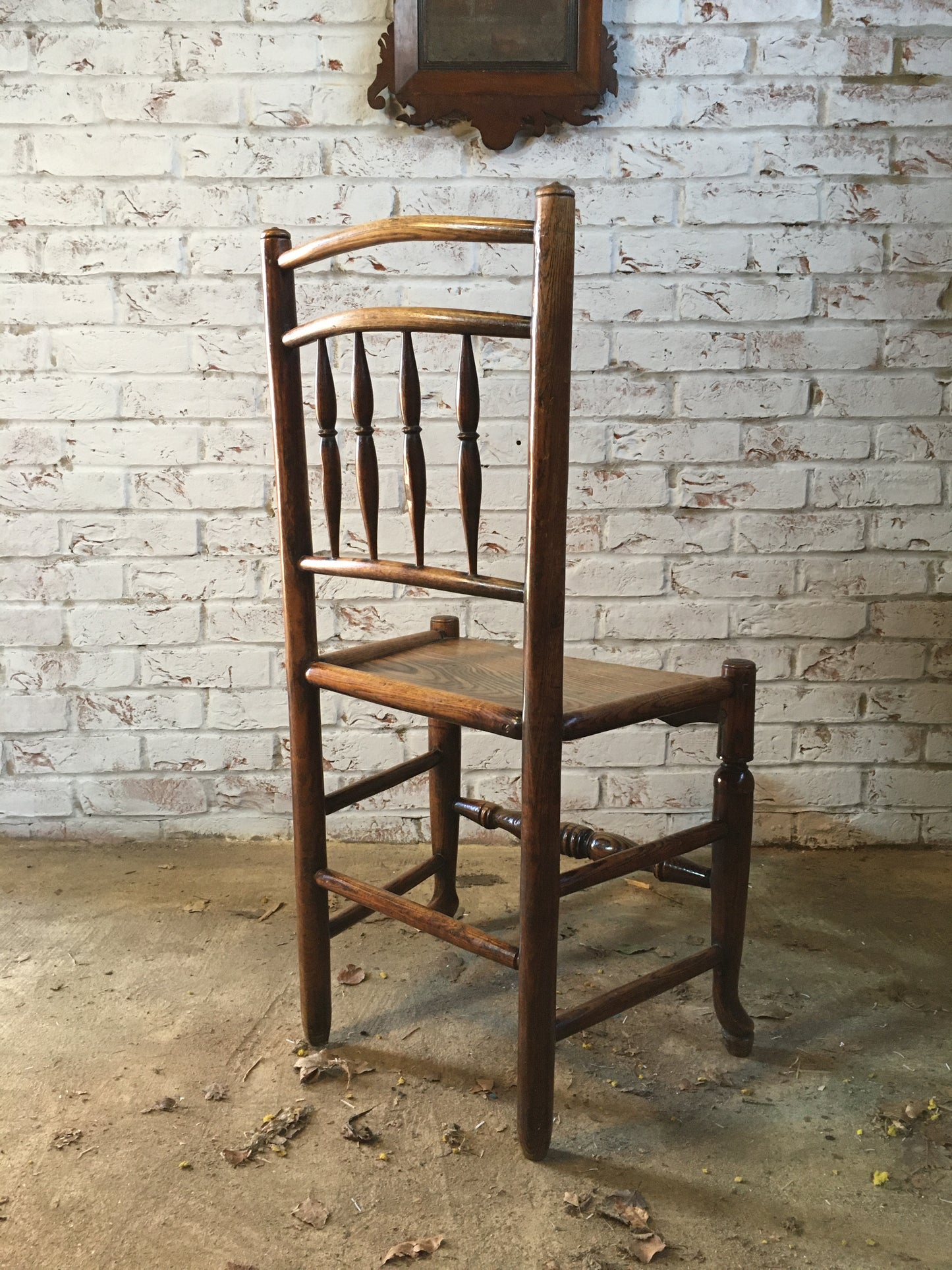 Early 19th century (or earlier) spindle-back side chair.