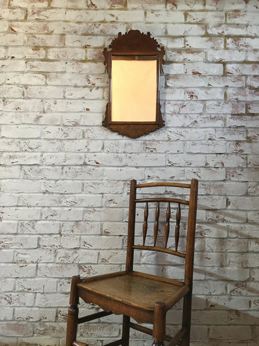 Georgian style walnut fret cut wall mirror.
