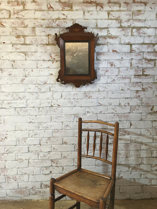 18th century mahogany wall mirror.