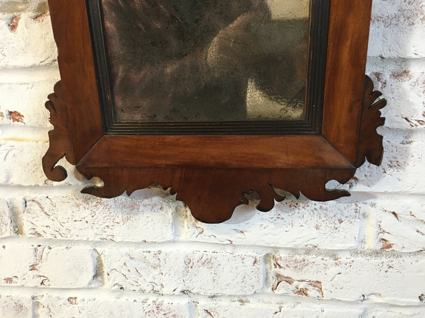 18th century mahogany wall mirror.