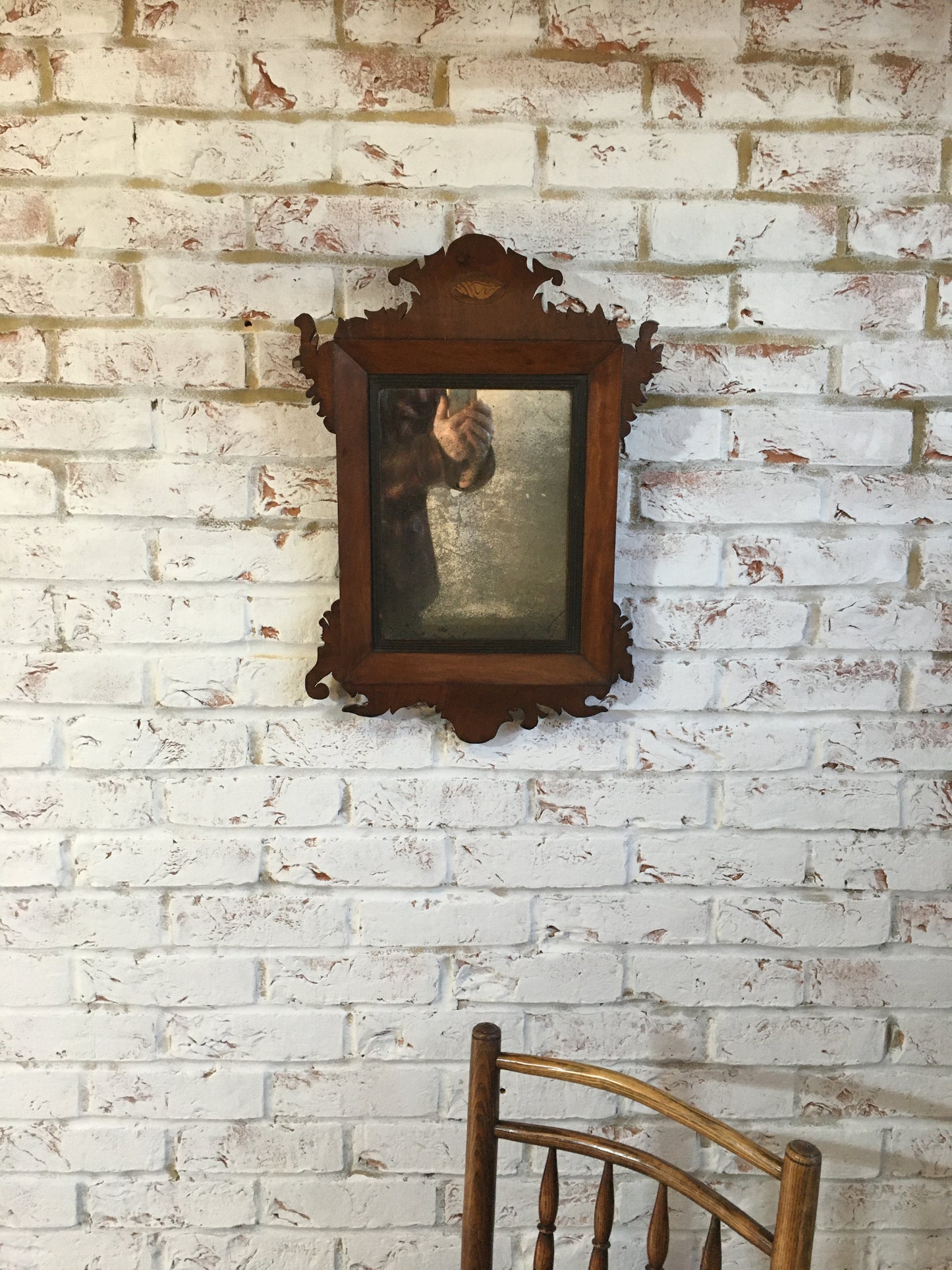 18th century mahogany wall mirror.