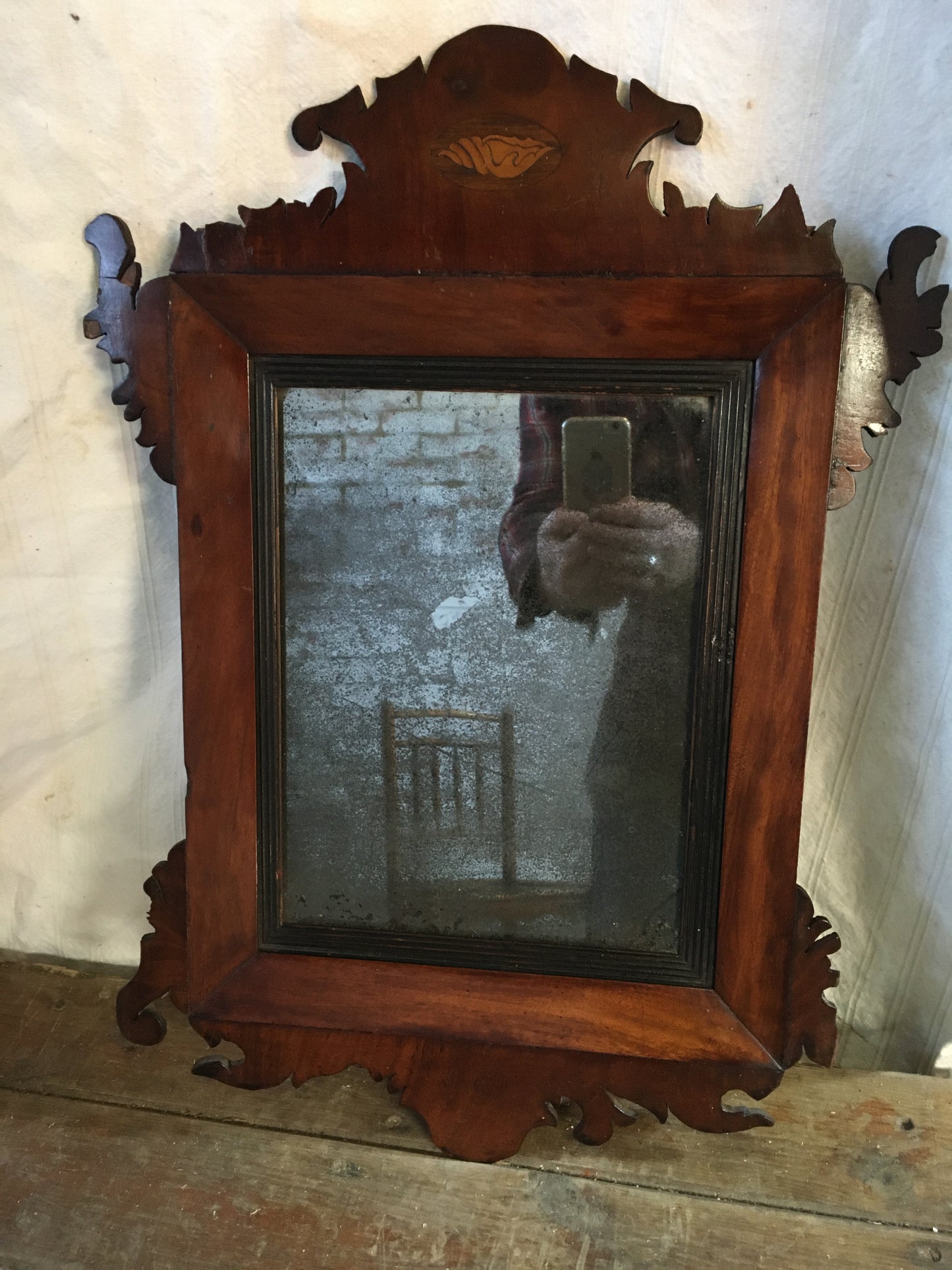 18th century mahogany wall mirror.