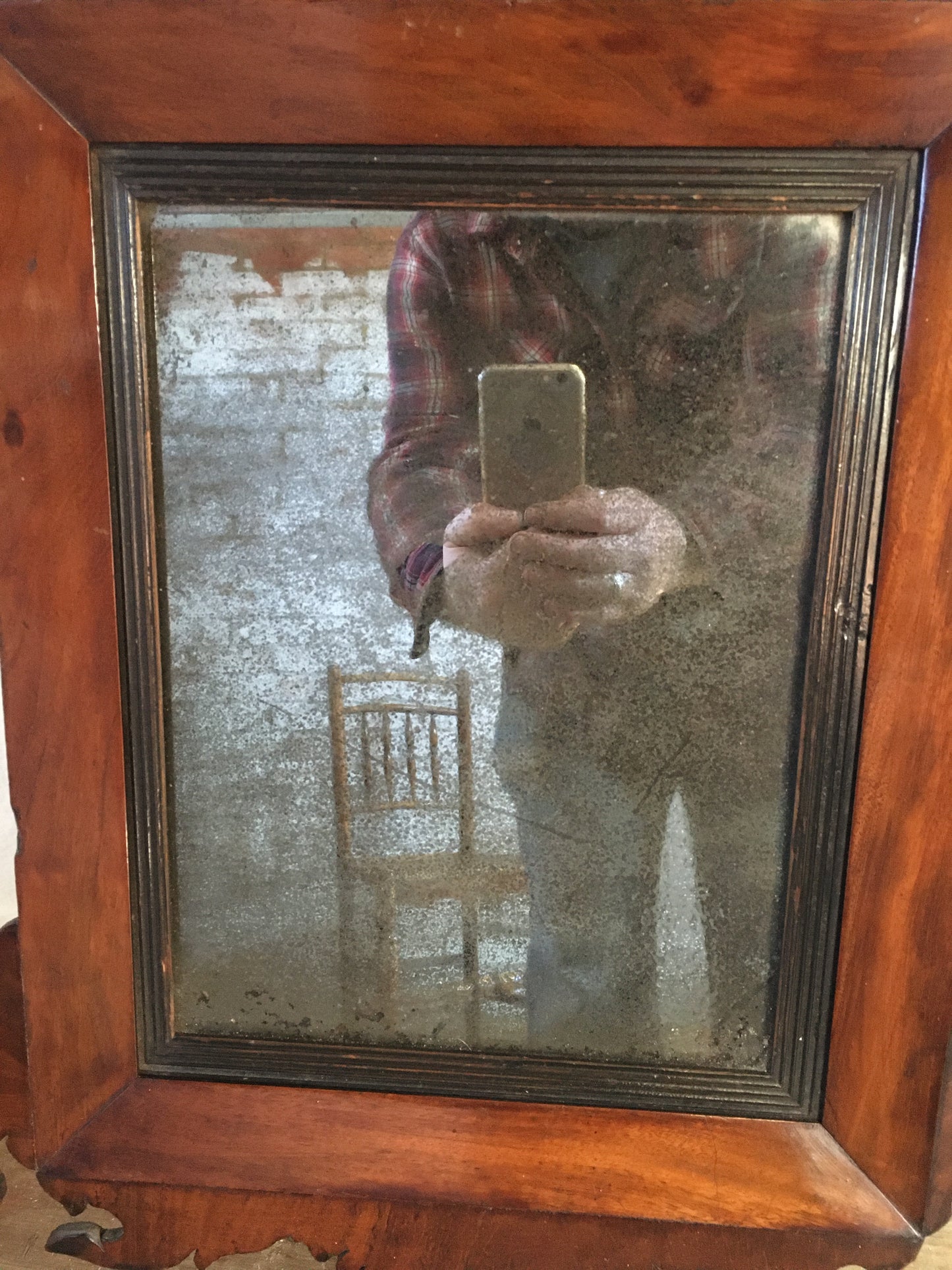 18th century mahogany wall mirror.