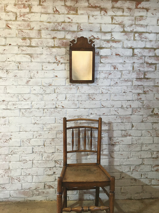 Small Georgian walnut fret cut wall mirror.