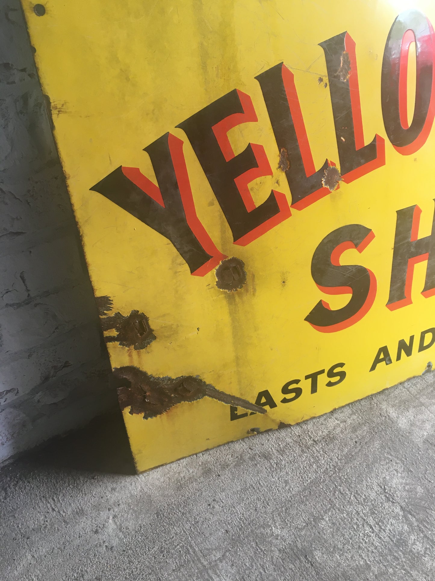 Large vintage enamel sign for "Bigg's Yellow Label Shag".