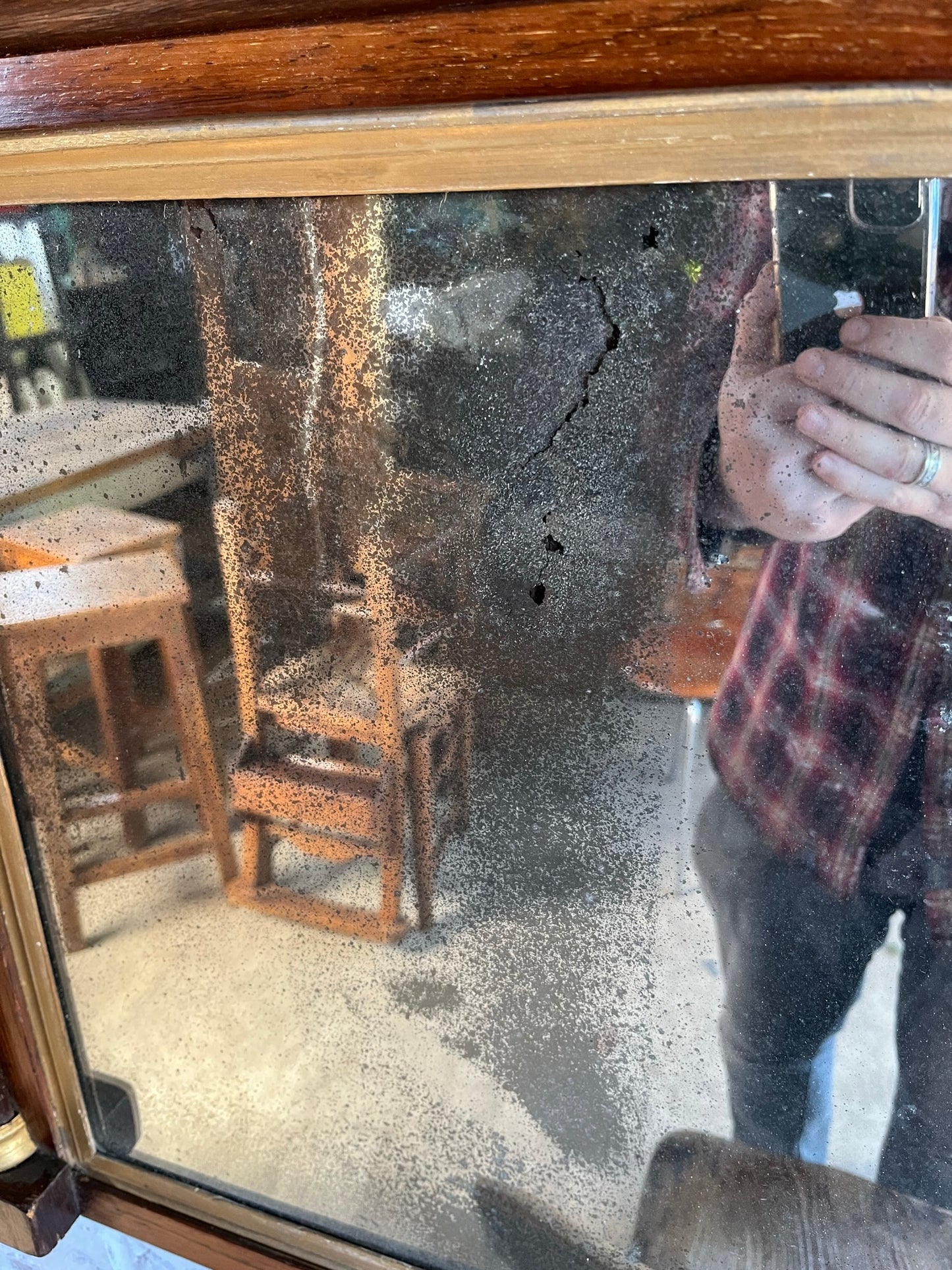 Regency rosewood and gilt overmantel or wall mirror with original foxed plate.
