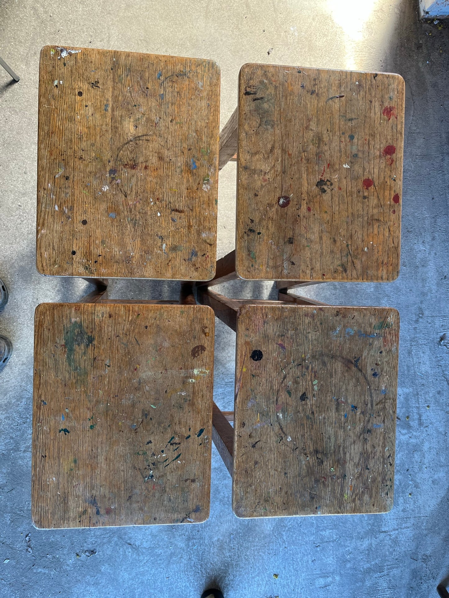Set of four tall vintage oak school/lab/factory stools with old paint.
