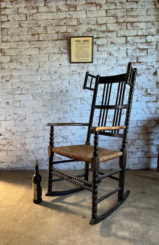 Arts and Crafts bobbin-turned rocking chair, in the style of Ernest Gimson, circa 1900-1910.
