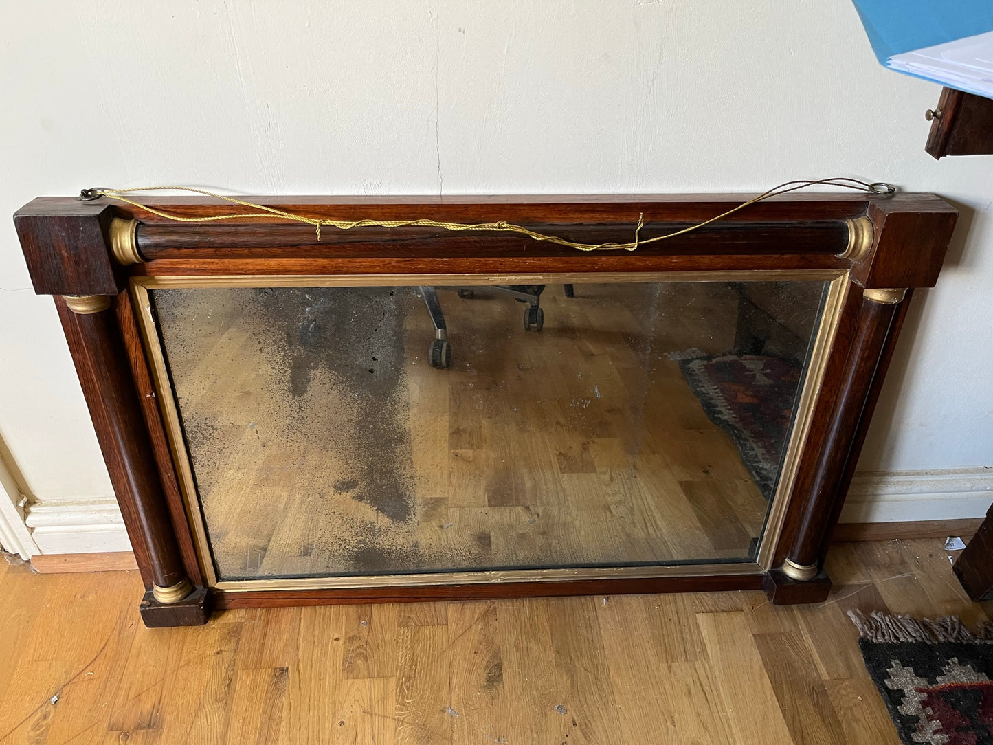 Regency rosewood and gilt overmantel or wall mirror with original foxed plate.