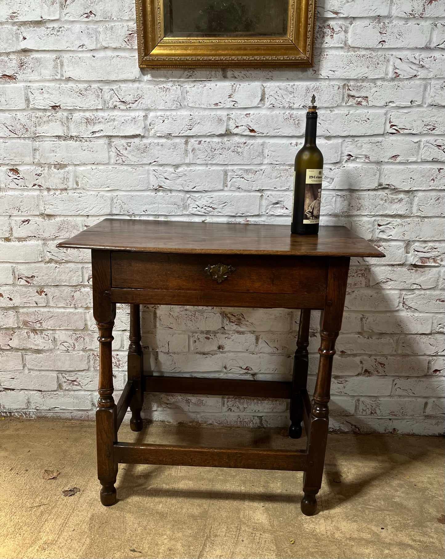 Early 18th century oak side table.