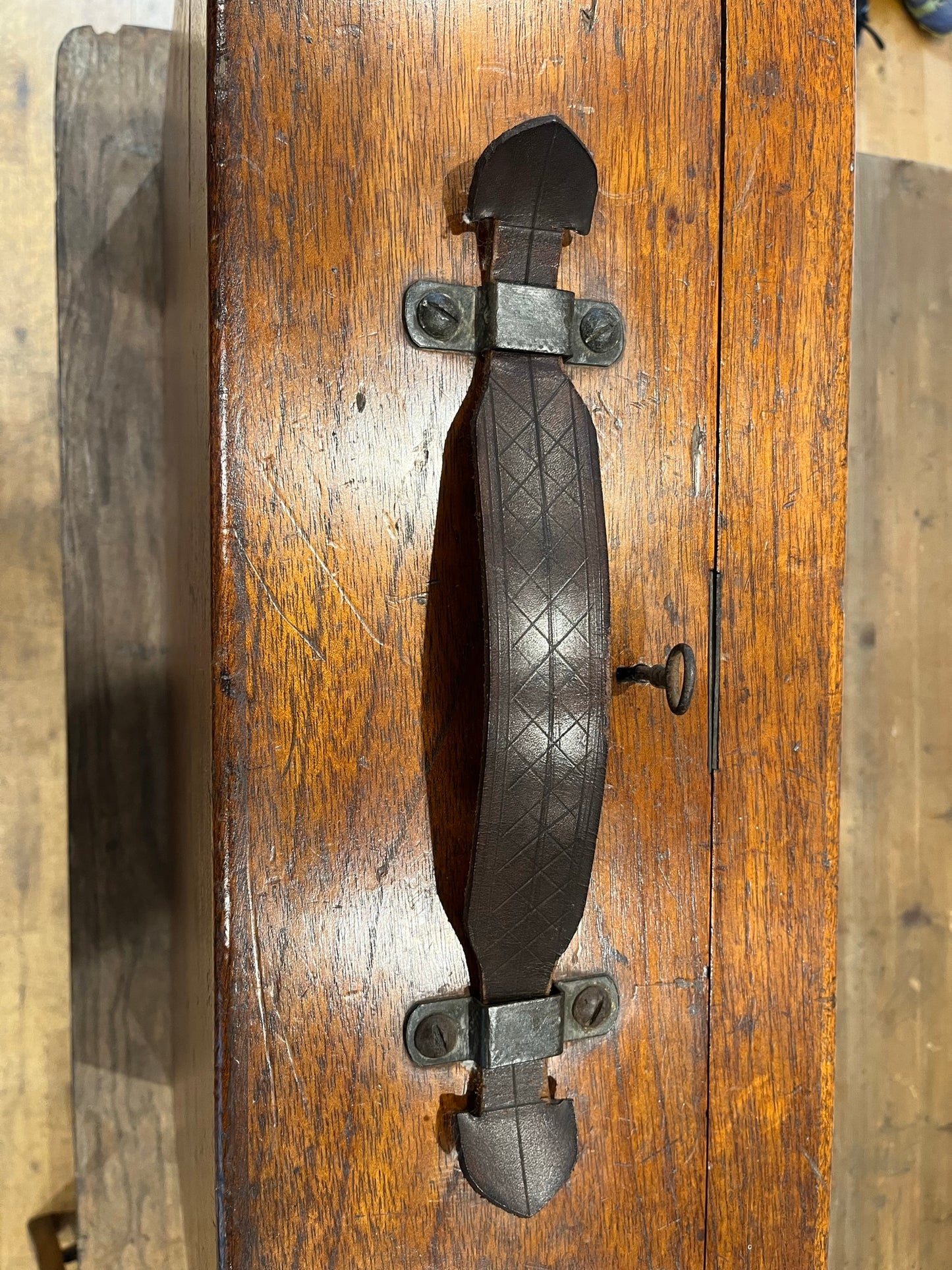 Intriguing early 20th century walnut case with key and Spanish tickets/leaflets lining.