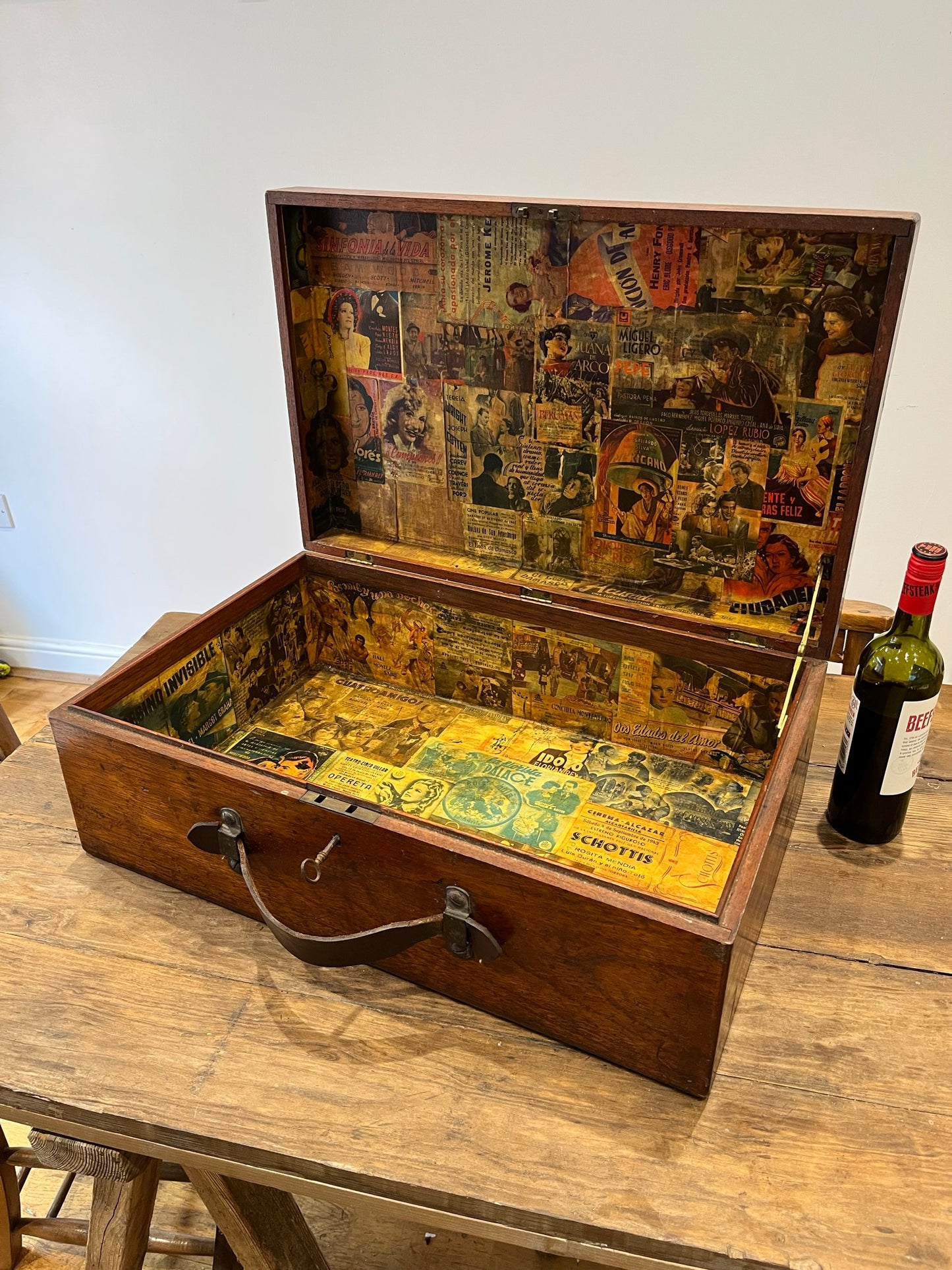 Intriguing early 20th century walnut case with key and Spanish tickets/leaflets lining.