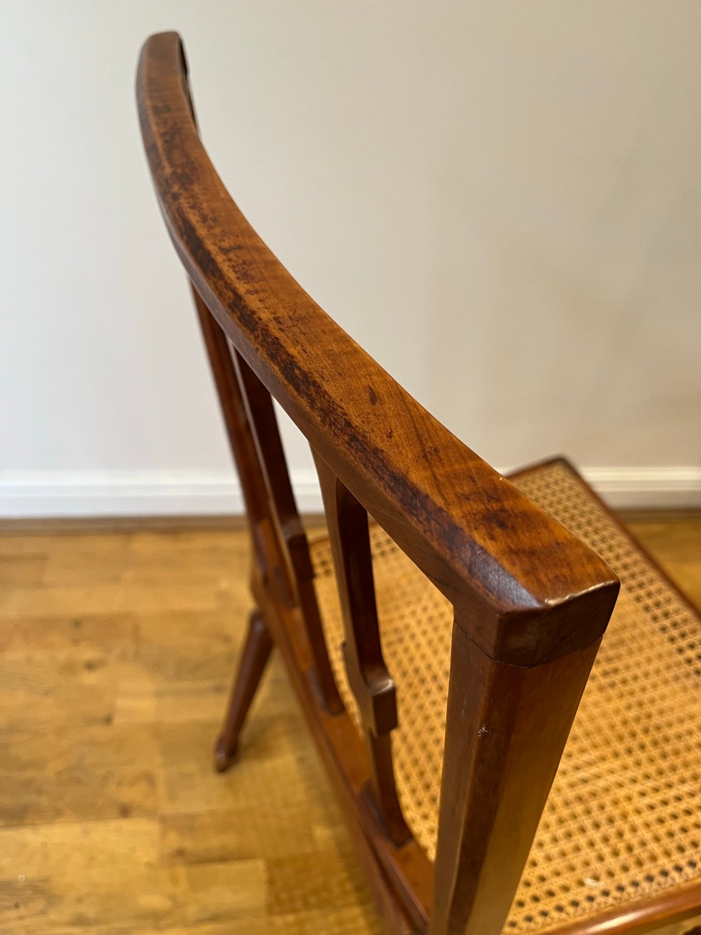 Fine cane-seated chair from Brudenell House, Bucks, in the manner of Gillows.