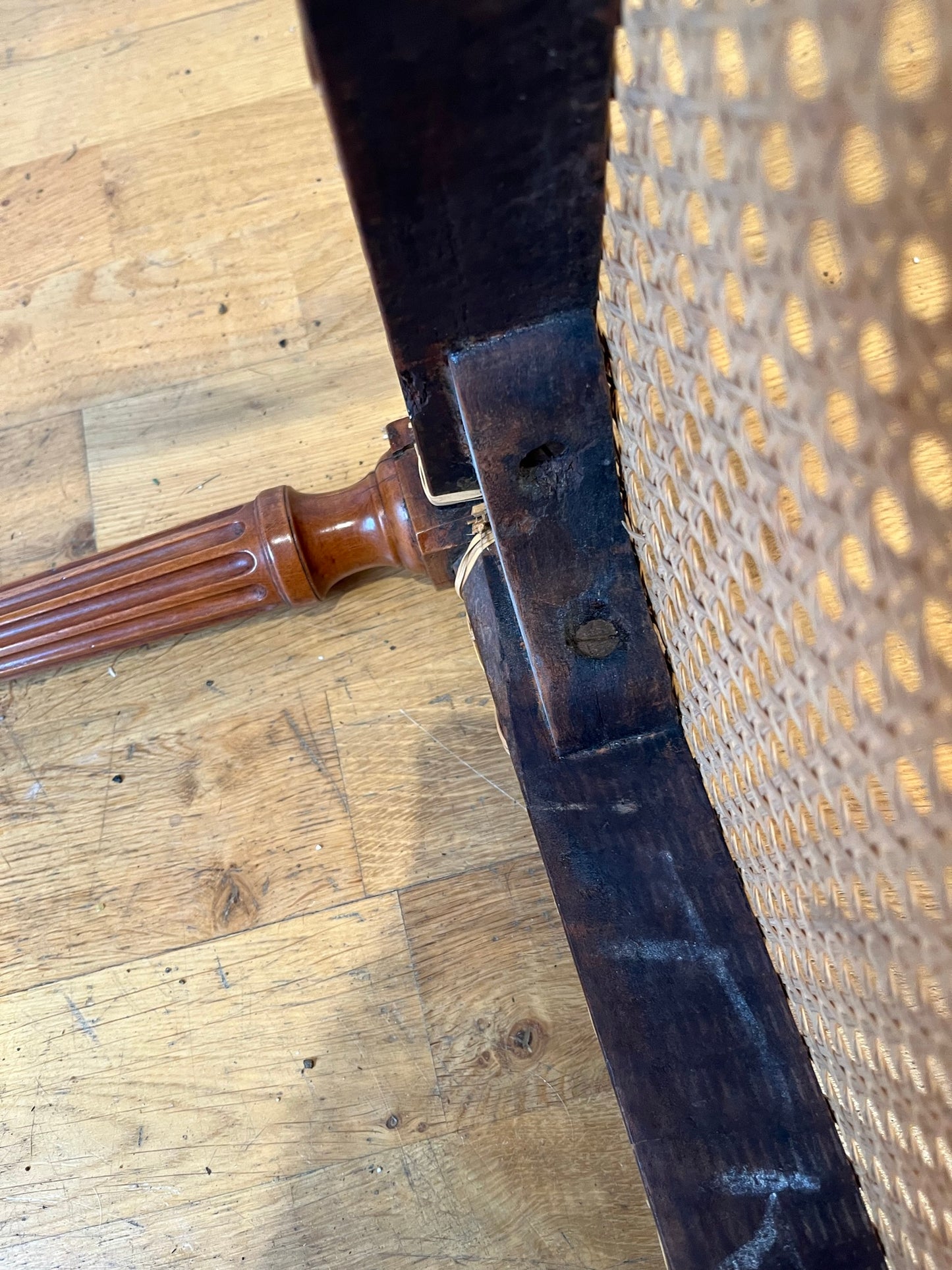 Fine cane-seated chair from Brudenell House, Bucks, in the manner of Gillows.