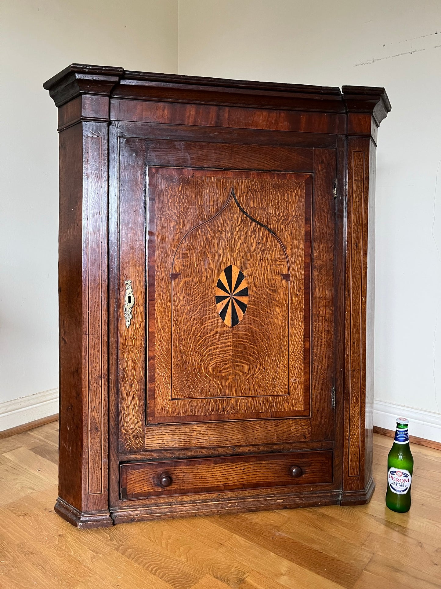 Georgian oak corner cupboard from country house, with provenance.