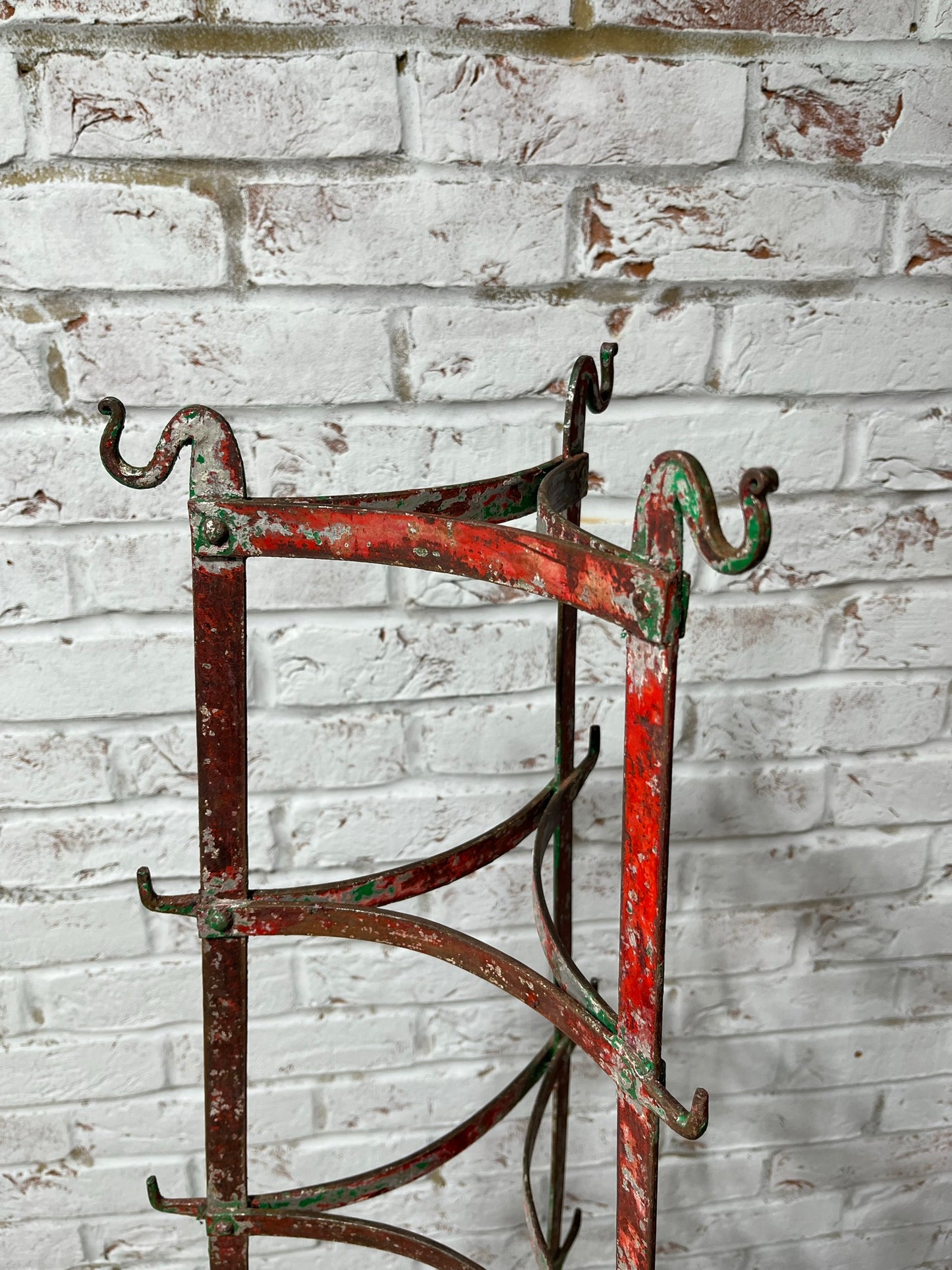 Large kitchen pots and pans rack with hooks.