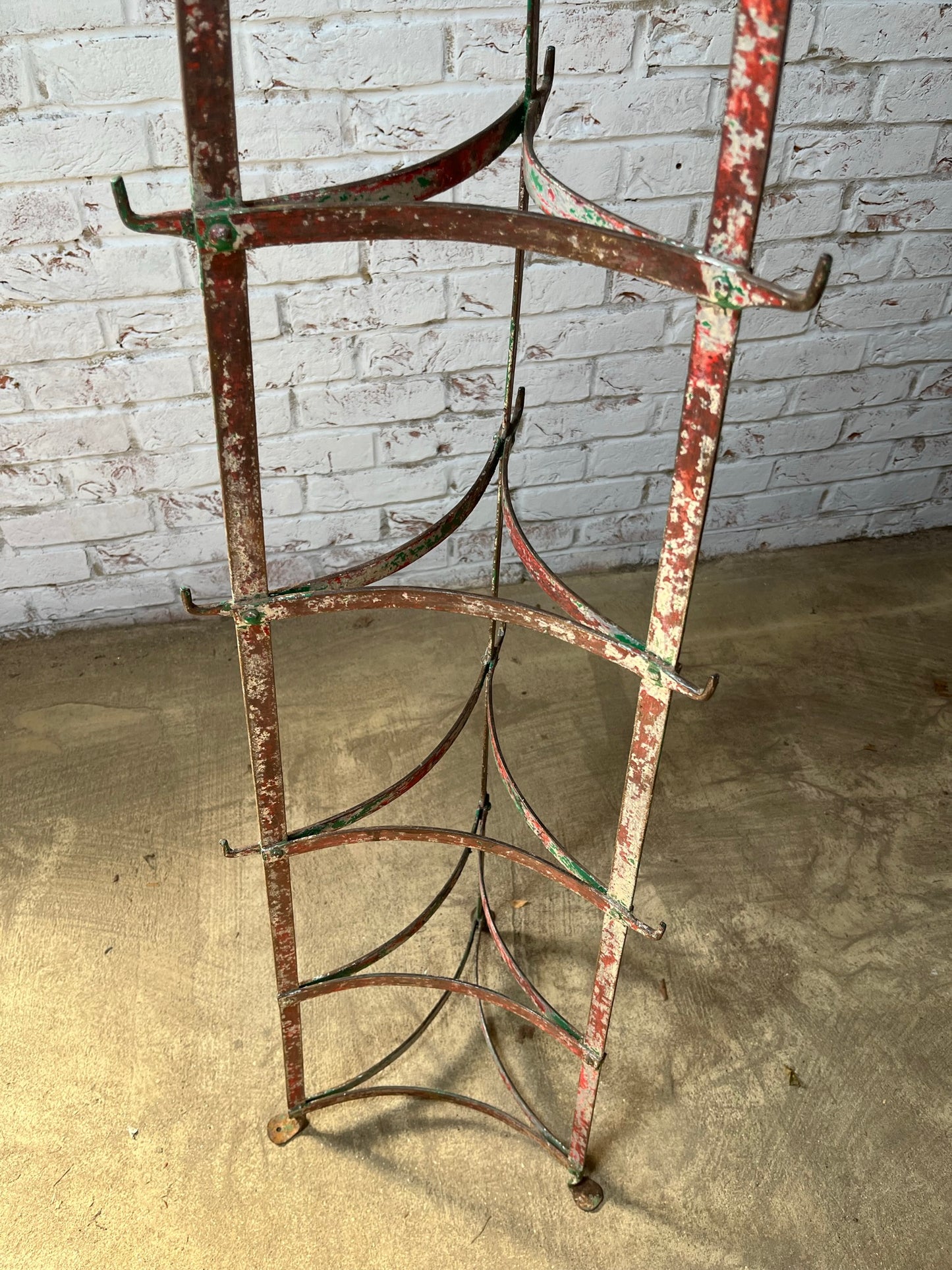 Large kitchen pots and pans rack with hooks.