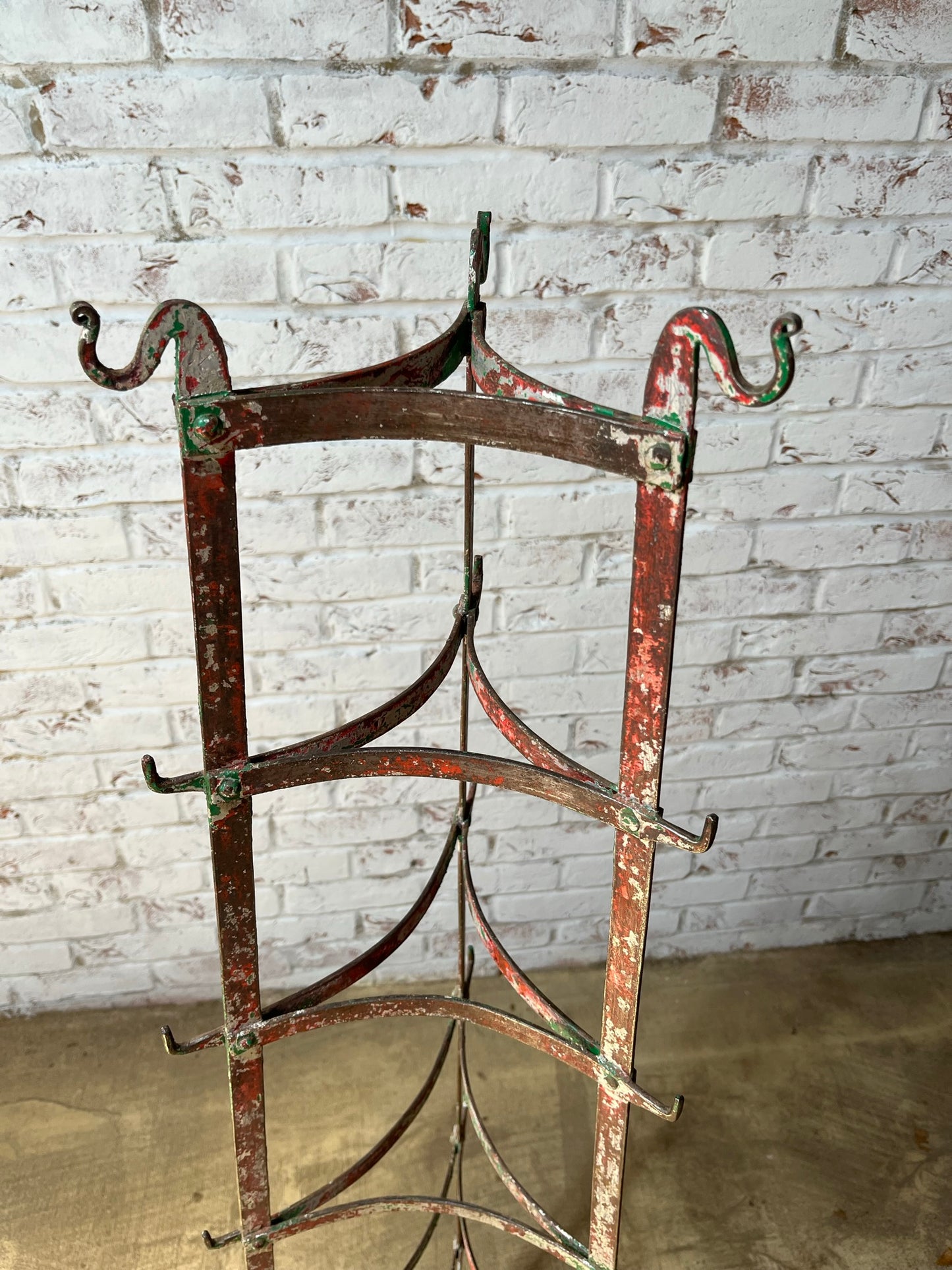 Large kitchen pots and pans rack with hooks.