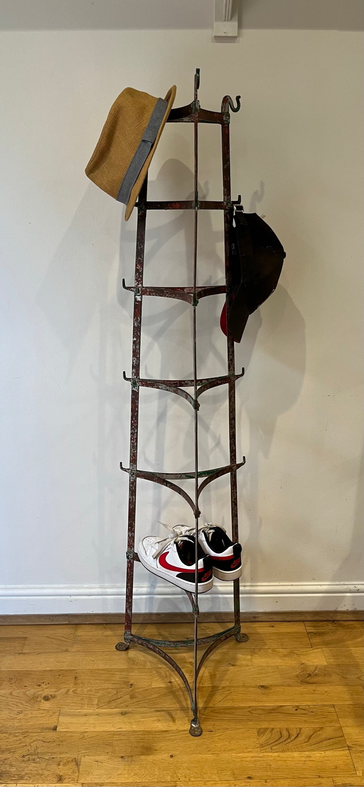 Large kitchen pots and pans rack with hooks.