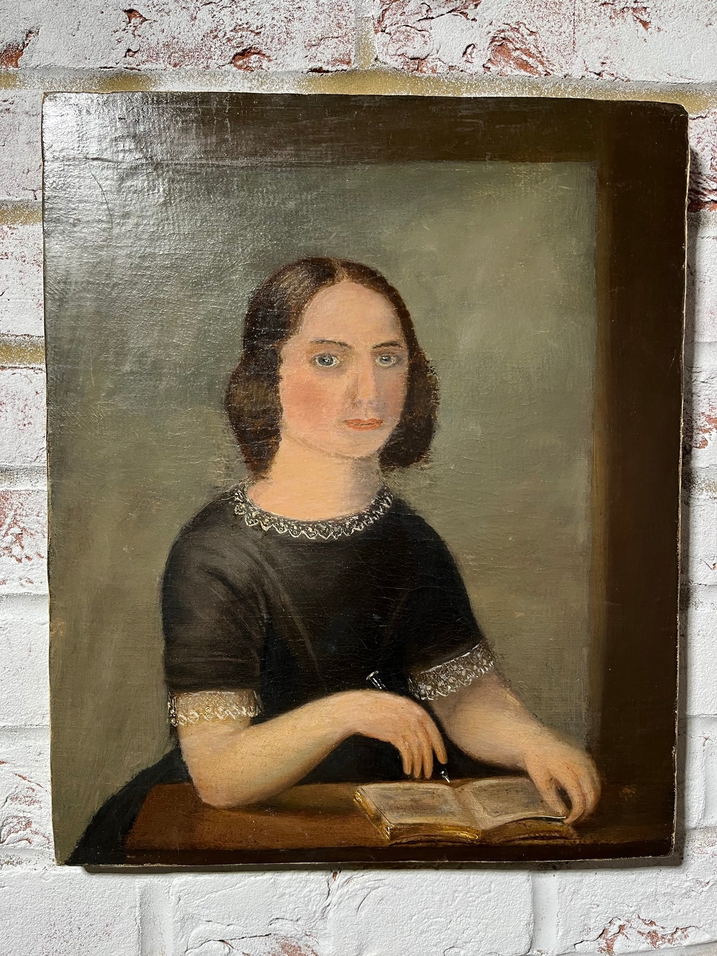 Late 19th century naïve oil painting of seated lady.