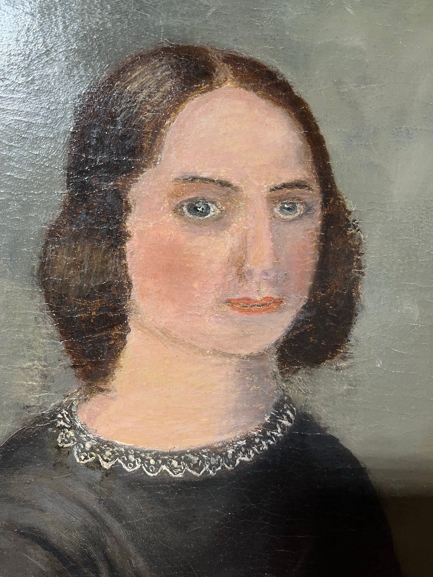 Late 19th century naïve oil painting of seated lady.