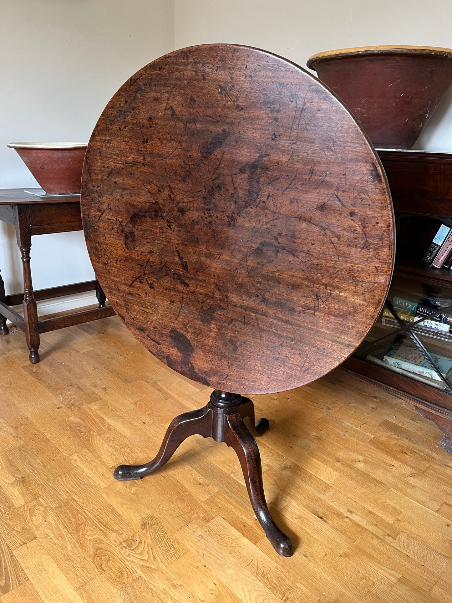 Untouched mid 18th century mahogany tripod tilt top occasional table.