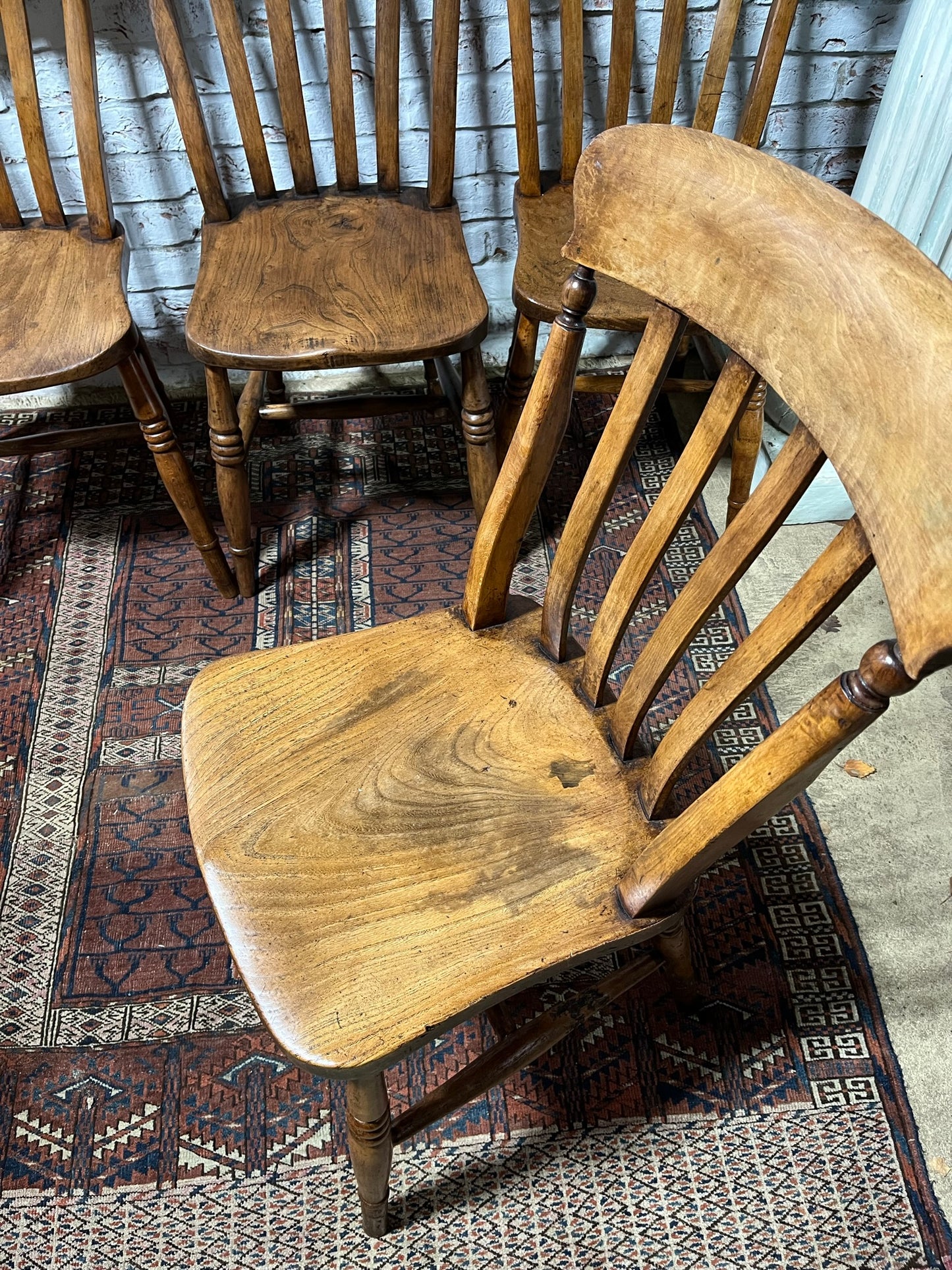 Set of 4 Victorian slat back farmhouse dining chairs.