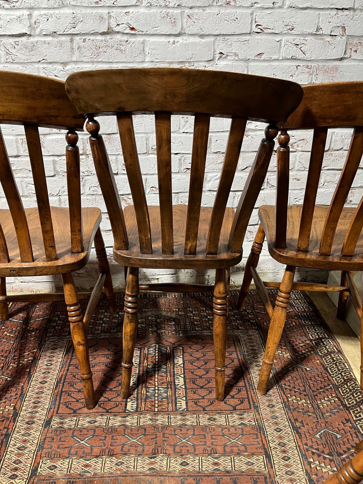Set of 4 Victorian slat back farmhouse dining chairs.