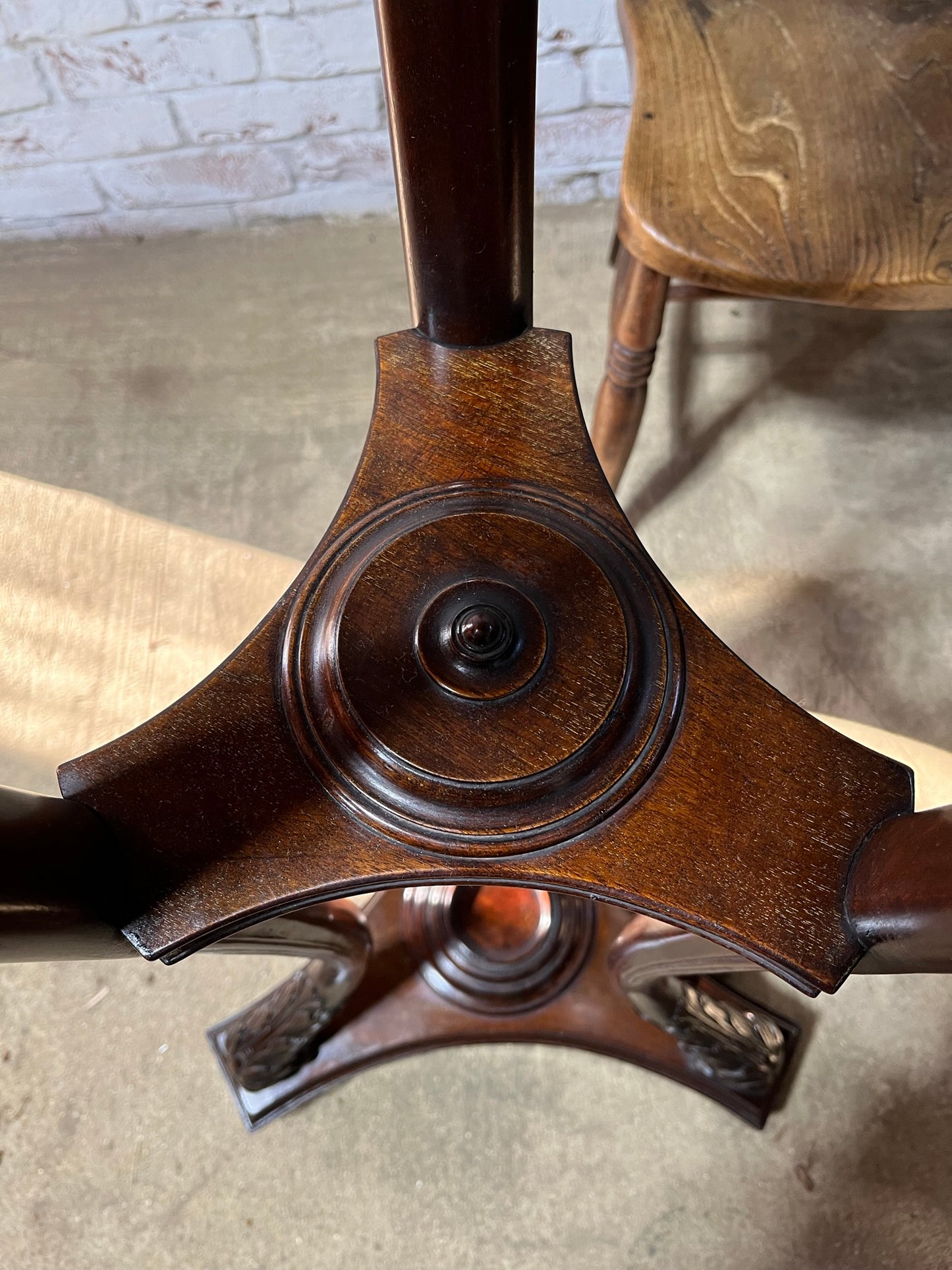 A very large mahogany plant stand, torchere or jardiniere.