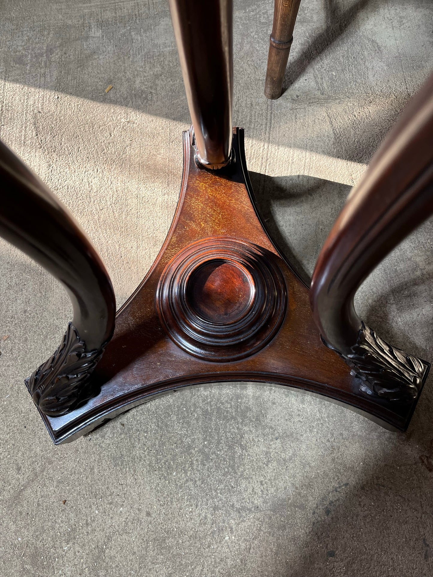 A very large mahogany plant stand, torchere or jardiniere.