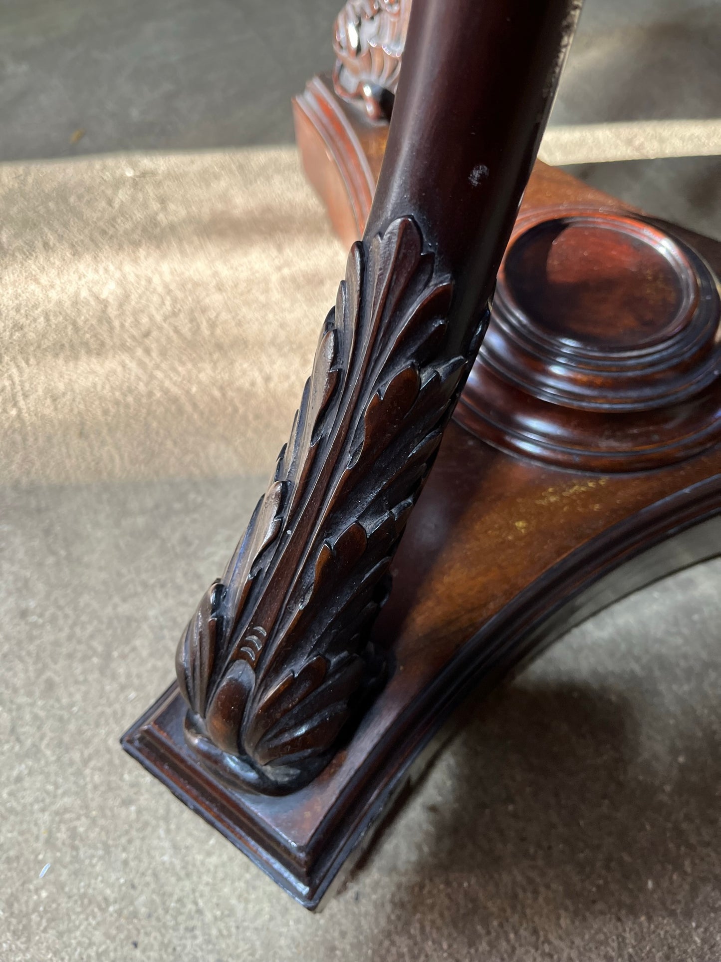A very large mahogany plant stand, torchere or jardiniere.