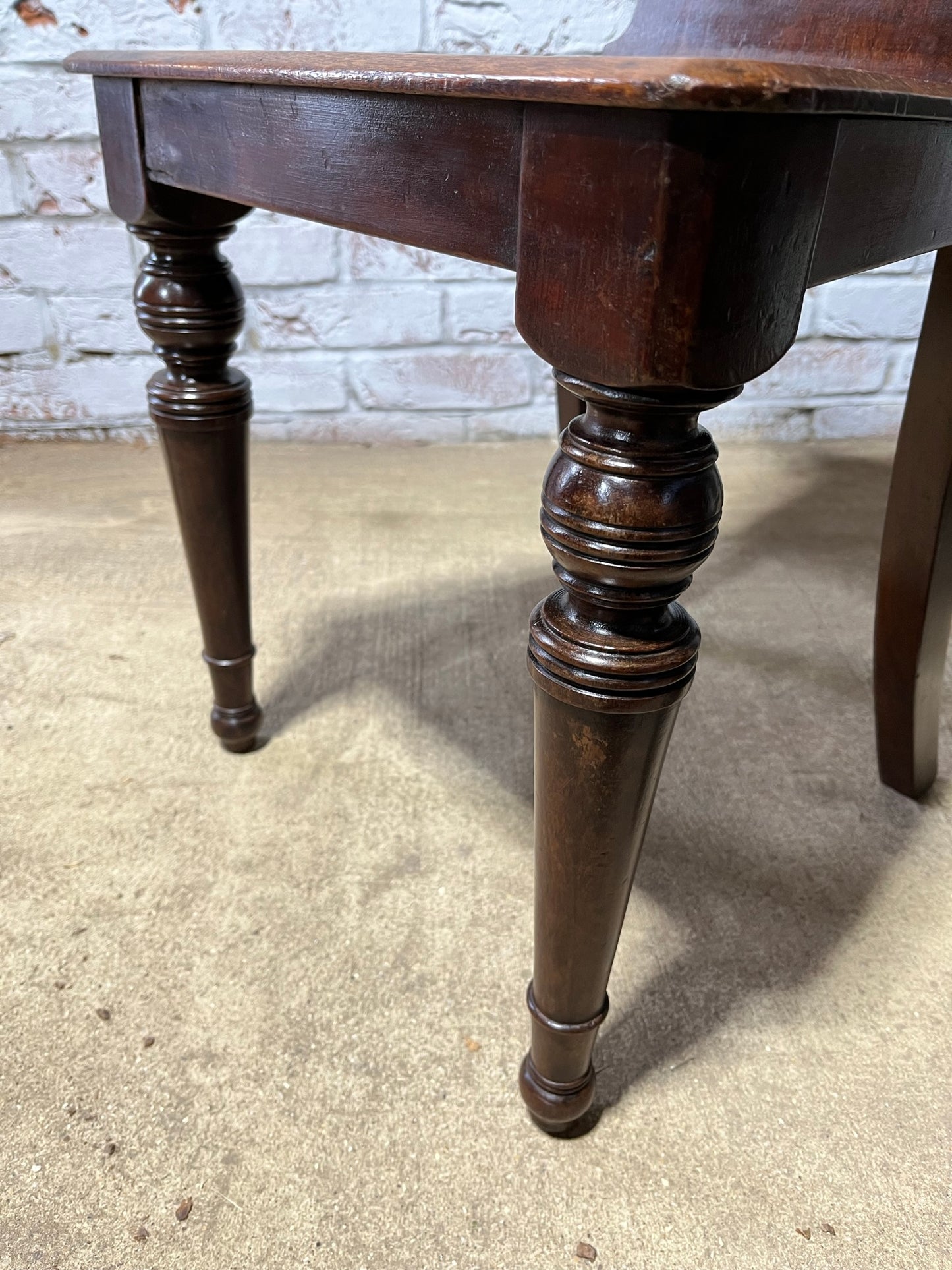 A pair of Gothic hall chairs.